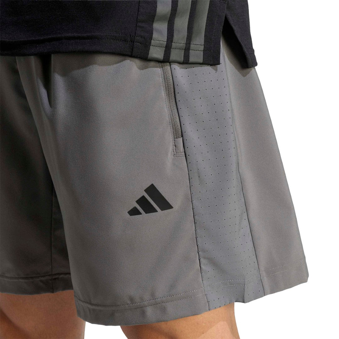 WORKOUT ESSENTIALS BASE WOVEN SHORT