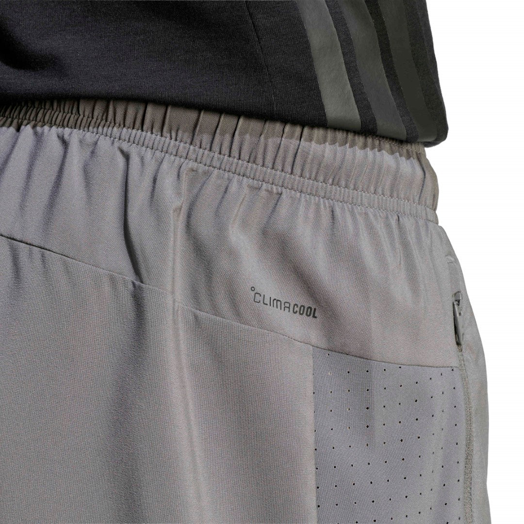 WORKOUT ESSENTIALS BASE WOVEN SHORT