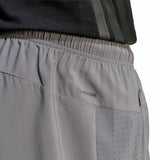 WORKOUT ESSENTIALS BASE WOVEN SHORT